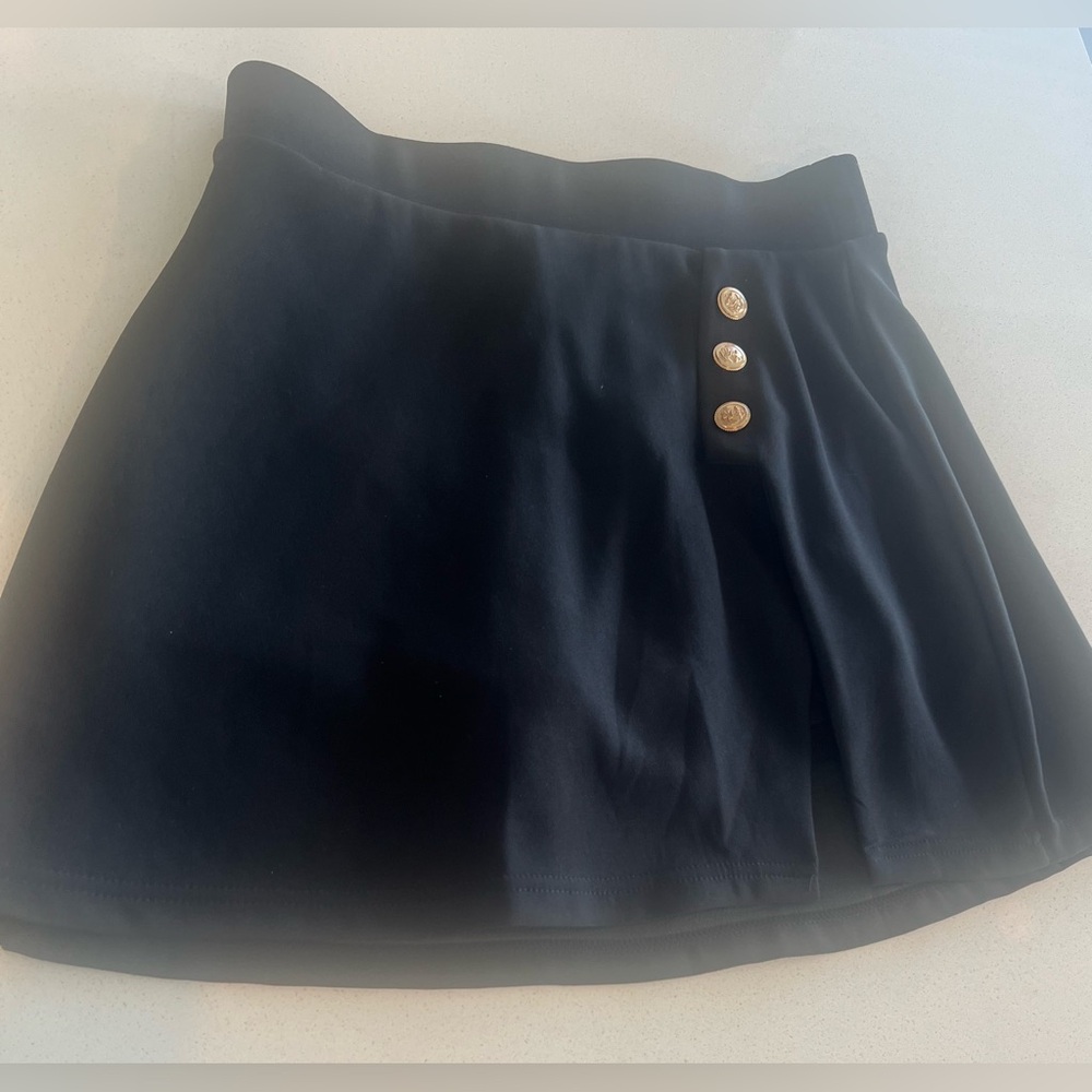 Elegant Black Skirt with Gold Button Accents